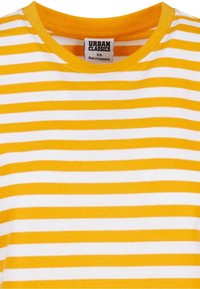 Yellow and white striped t-shirt featuring a crew neck and soft fabric. Label reads “URBAN CLASSICS,” size XS, made in Bangladesh.