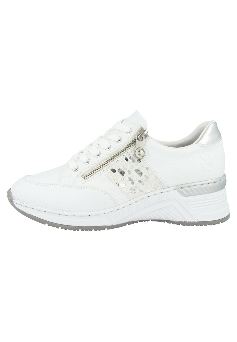 White sneaker with a textured surface, silver accents, and a decorative zipper. Features a cushioned sole and patterned side panel.