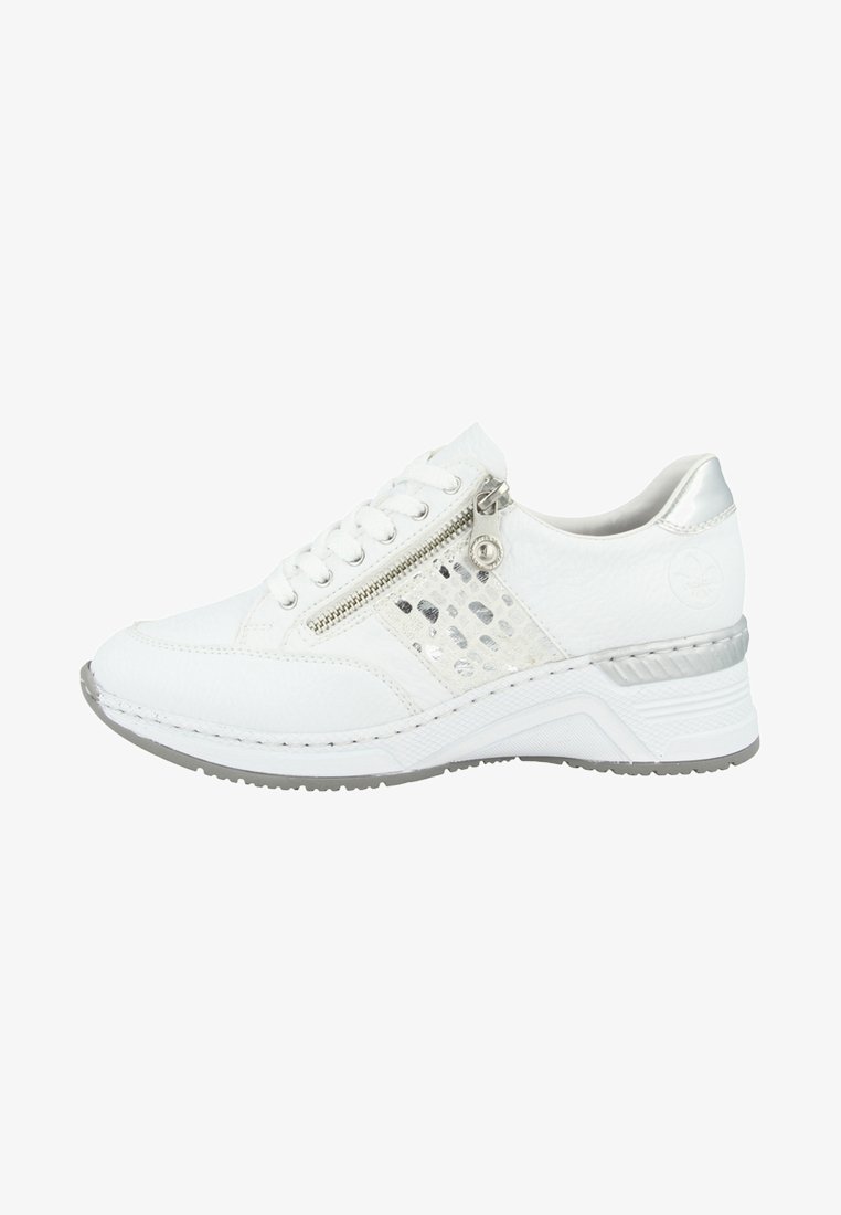 White sneaker with a textured surface, silver accents, and a decorative zipper. Features a cushioned sole and patterned side panel.