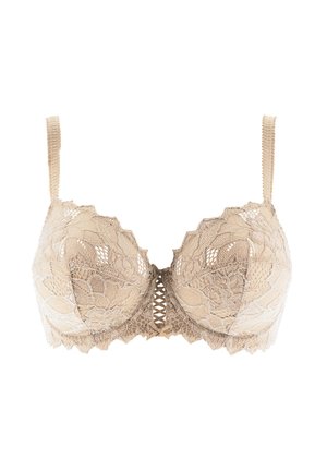 Lace bra in nude color featuring floral patterns, scalloped edges, and a front closure with a crisscross design for added detail.