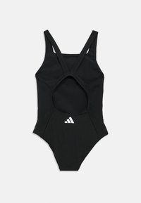 Μαύρο ολόσωμο μαγιό με λουράκια που διασταυρώνονται στην πλάτη, άνοιγμα στην πλάτη και λευκό λογότυπο Adidas στο μπροστινό μέρος. Κατασκευασμένο από λεία ύφασμα.