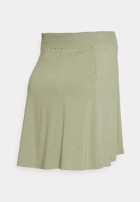 SKIRT UNDER THE BELLY - Saia evasé - real olive