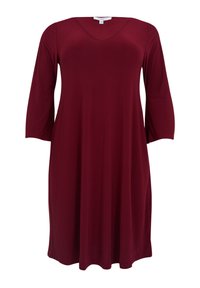 Bordeaux Kleid, knielang, aus glattem Stoff. Mit V-Ausschnitt und dreiviertel Ärmeln sowie einer lockeren A-Linie Silhouette.