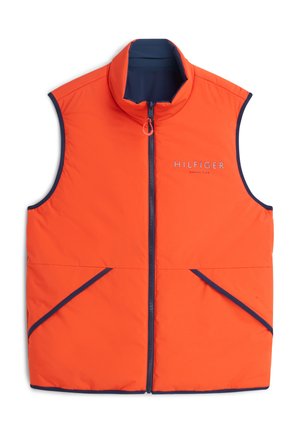 Hellorangefarbenes, ärmelloses, wattiertes Weste mit marineblauem Besatz, Front-Reißverschluss, zwei schrägen Taschen und "Hilfiger Marina Club"-Logo auf der Brust.
