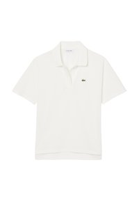Vit pikétröja i bomull, med en tvåknäppt knäppning, korta ärmar och en grön Lacoste-logotyp på vänster bröst.