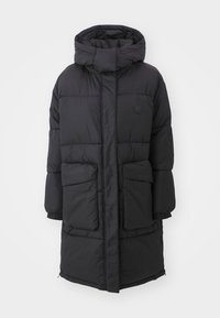 Black puffer coat with a hood, featuring a zip closure, two front pockets, and elastic cuffs. Smooth texture with quilted sections.