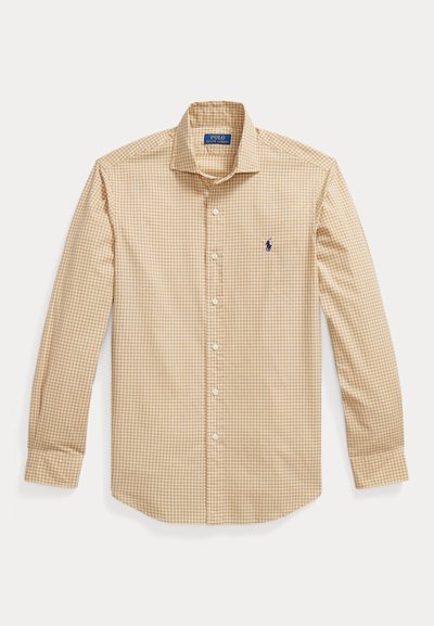 Бежова риза с дълъг ръкав с малък каре и синьо лого на Polo Ralph Lauren отляво на гърдите.
