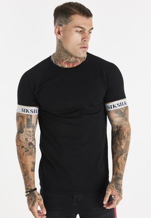 TAPE RAGLAN TECH - T-shirt con stampa - black