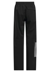 Pantalons imperméables noirs avec une taille élastique, dotés d'une poche arrière et de trois bandes verticales blanches sur la jambe gauche.