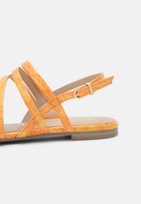 Tamaris Sandaalit nilkkaremmillä - orange