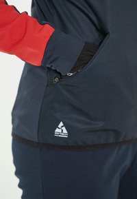 Endurance Softshell jakker - dark sapphire