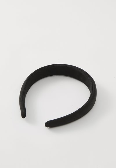 Black fabric headband, smooth texture, rounded edges, lightweight design, and non-slip interior for secure fit.