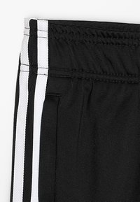 adidas Originals SUPERSTAR PANTS - Träningsbyxor - black/white