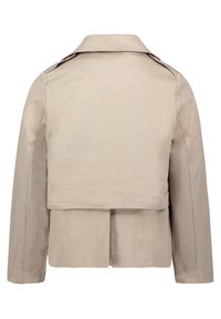 Beige jas met een gestructureerde kraag, achterflapdetail, lange mouwen en zichtbare stiksels. Glad materiaal met een rechte snit.