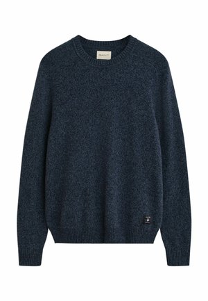 Maglione lavorato a maglia blu navy con scollo rotondo e maniche lunghe, caratterizzato da una leggera trama e una piccola etichetta con il marchio sull'orlo.