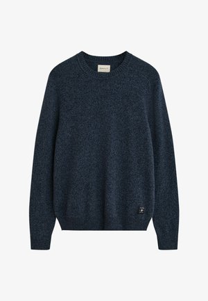 Maglione lavorato a maglia blu navy con scollo rotondo e maniche lunghe, caratterizzato da una leggera trama e una piccola etichetta con il marchio sull'orlo.