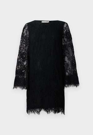 Black lace mini dress with long sheer floral lace sleeves and scalloped hem, featuring a round neckline.