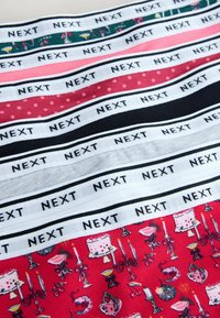 Cotton mix underwear with various patterns; includes a red print with cakes and candles, and solid colors like pink, green, and black.