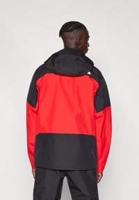 The North Face JAZZI JACKET - Veste Hardshell - high risk red/black