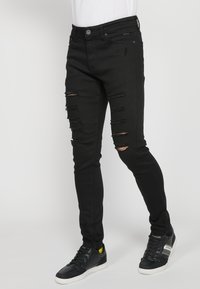 Koroshi Oprijete (skinny) kavbojke - denim black denim