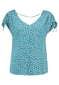 Top verde azulado hecho de una tela ligera, con escote en V, mangas cortas abullonadas con lazadas y un patrón de lunares blancos por toda la prenda.