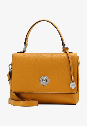 Sac à main en cuir jaune texturé avec poignée supérieure, bandoulière réglable, fermoir tourniquet argenté, et étiquette métallique circulaire de la marque sur le côté.