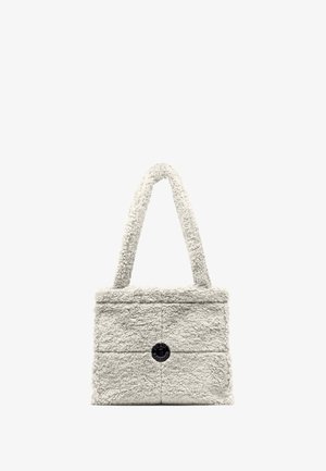 Kleine rechthoekige schoudertas van grijs teddy fleece-stof met een zwart cirkelvormig logo aan de voorkant.