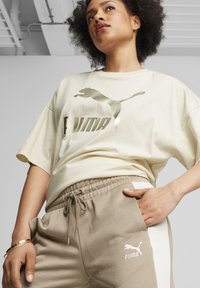 Puma ICONIC - Tepláky - oak branch