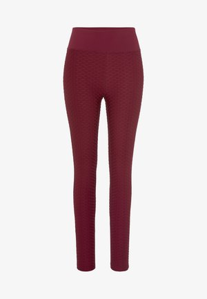 Burgundy leggings with a textured hexagonal pattern, high-rise waistband, smooth fabric, and a fitted silhouette, designed for comfort.