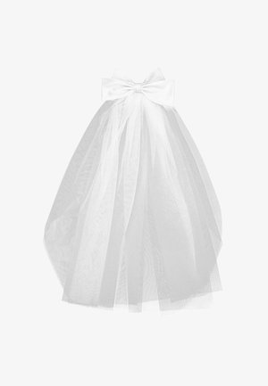 Gonna in tulle bianco con texture a strati e un fiocco in satin in vita. Progettata con una silhouette ampia e fluente.