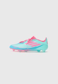 Light blue and pink soccer cleat with textured surface, featuring laces, a streamlined design, and clear studs for traction.