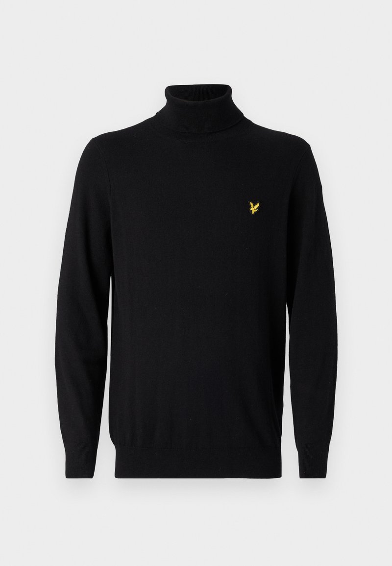 Pull col roulé noir en tissu doux, avec des manches longues et un petit logo jaune sur la poitrine gauche. Texture tricot à plat.