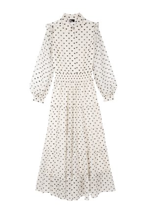 Lang, hvid kjole med lille gråt hjerteprint, knaplukning foran, flæser ved skuldrene og lagdelt tæppet nederdel. Lavet af let stof.