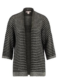 Svart och vit randig cardigan, stickad textur, trekvartsärmar, öppen framsidan design, lös passform, med en subtil glanseffekt.
