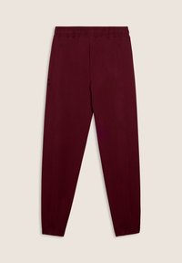 Pantaloni di felpa bordeaux con elastico in vita, gambe affusolate e tasche laterali; presenta un logo nero stampato sulla gamba sinistra.
