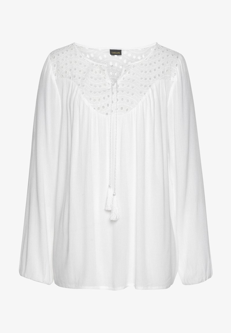 Witte blouse met lange mouwen, een gestructureerde bovenkant, oogjesdetail en een trekkoordhalslijn met franjes. Zacht, lichtgewicht stof.