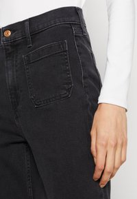 GAP 70S TAYLORSON - Alt laienevad teksad - basic black