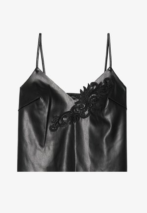 Zwarte nepleren camisolet met verstelbare spaghetti bandjes en ingewikkelde zwarte borduursels in een bloemmotief aan de voorkant.