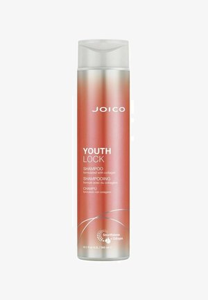 Joico Youth Lock Shampoo is in a tall, cylindrical, opaque bottle with a gradient finish from rose gold to silver and features a flip-top lid.