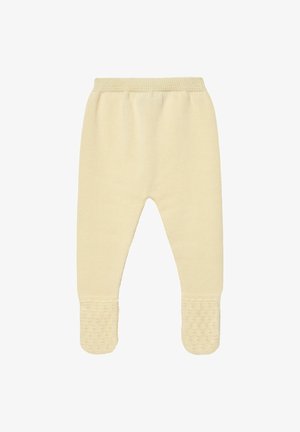Pantalon en maille jaune douce pour bébé avec pieds fermés et taille élastique, avec des grips texturés sous les semelles pour éviter les glissades.