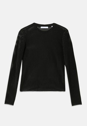 Haut noir à manches longues avec une texture côtelée, un col rond et une coupe droite. Le tissu semble transparent et léger.