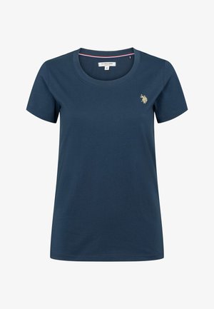 Tricou din bumbac albastru închis, cu gât rotund, mâneci scurte și un mic logo auriu pe partea stângă a pieptului. Textură simplă și netedă.