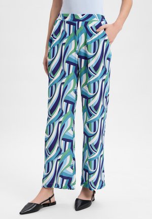 Pantalons multicolores avec un motif ondulé en bleu, vert et blanc. Fabriqués en tissu léger avec des poches latérales et une coupe décontractée.