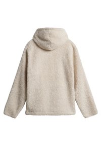 Felpa color crema realizzata in un tessuto morbido e strutturato. Presenta una cucitura sul retro e un cappuccio ampio. Maniche lunghe con una vestibilità comoda.