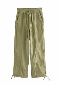 Pantaloni larghi verde chiaro realizzati in tessuto testurizzato, con vita elastica, cordoncino e tasche laterali. L'orlo presenta lacci regolabili.