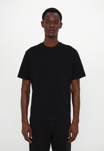 Black cotton t-shirt with a classic crew neckline and short sleeves, featuring a relaxed fit and smooth texture.