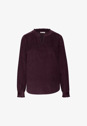 Blusa de pana color ciruela de manga larga con escote en V y cuello con volantes. Presenta puños fruncidos y un corte relajado para mayor comodidad.