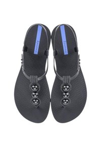 Infradito neri con suola testurizzata, parte superiore intrecciata con tre perle nere lucide e un'etichetta blu sulla cinghia.