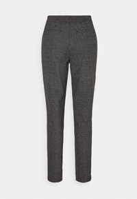 Pantalon à carreaux gris avec une jambe effilée, une taille élastique et deux poches arrière. Confectionné dans un tissu texturé à motif à carreaux.