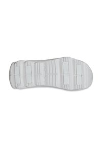 White rubber shoe sole with textured grip patterns, featuring accent stripes and a circular logo. Smooth finish, contoured shape.